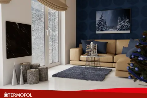 Nowoczesny grzejnik na podczerwień Termofol, ile pobiera prądu? Stylowy salon zimową porą.